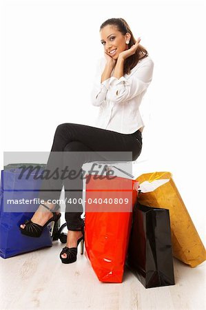Attractive woman with paper shopping bags
