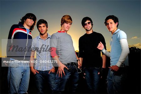 Portrait of young trendy teenager group posing