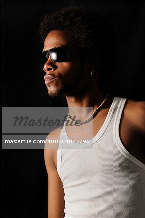 Portrait of young trendy african man with attitude