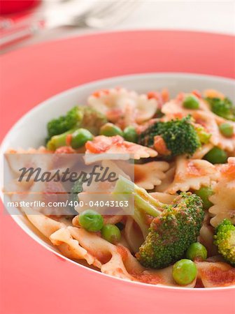 Pasta Bows with Tomato Sauce Broccoli and Peas