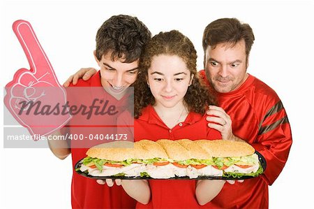 Hungry people at a football party, looking at a giant submarine sandwich.  Isolated on white.