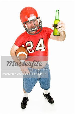 Middle aged guy in old football uniform, enjoying a cold beer.  Full body isolated.