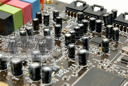 The printed-circuit-board with computer chips resistors and condensers