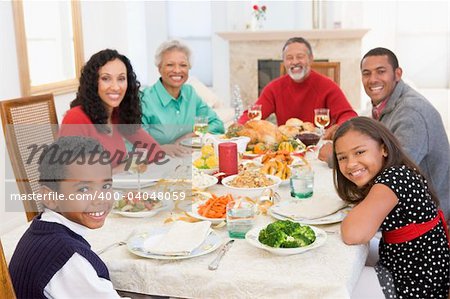 Family All Together At Christmas Dinner