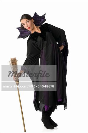 funny and nice witch making facial expression and taking funny pose