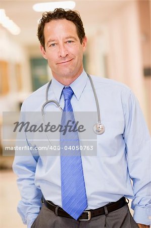 Doctor Standing In A Hospital Corridor