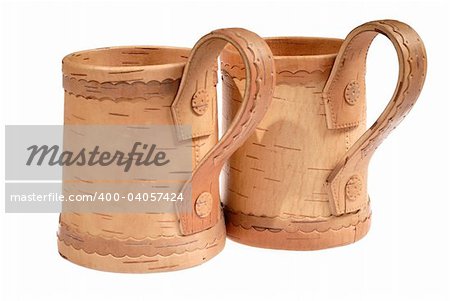 wooden mugs for beer on white background