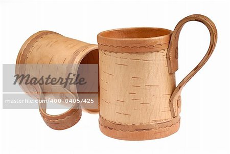 wooden mugs for beer on white background