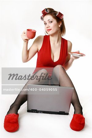 A sexy pretty young woman chats online.