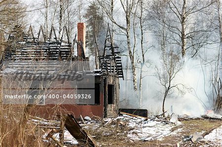 Ruins of house after big disaster - fire