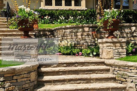 Natural stone landscaping in front of a house