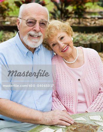 Beautiful senior couple in love in an outdoor setting.