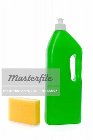 Yellow sponge and green bottle with dish soap on white background
