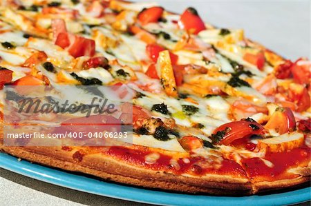 Freshly baked mediterranean pizza served on a plate