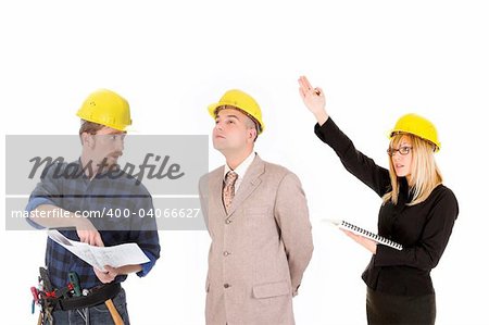 angry businesswoman,  businessman and construction workers with architectural plans