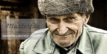 Vintage grungy portrait of smiling old man