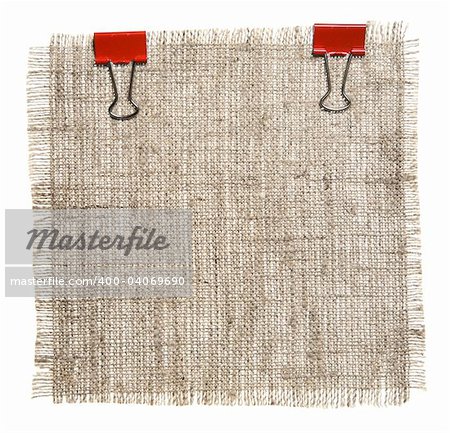 Cotton Patch With Red Clips Isolated On White Background. Ready for your message.