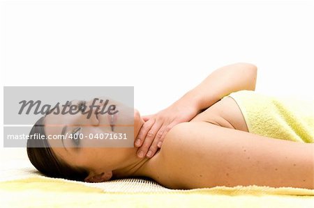 attractive brunette woman relaxing in spa