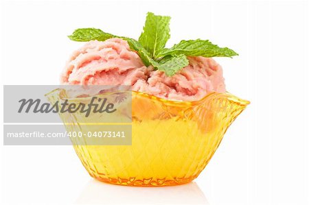 Delicious raspberries ice cream in glass bowl reflected on white background. Shallow depth of field