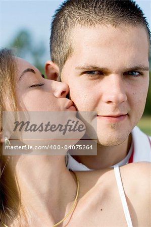 young couple kissing