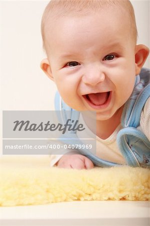 Portrait of cute newborn laughing