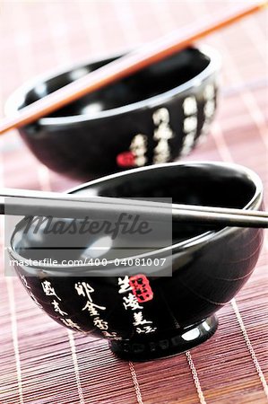 Two rice bowls and chopsticks close up