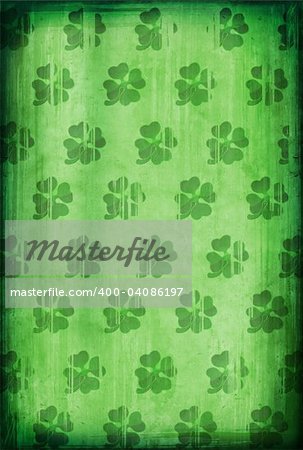 Grunge background with four-leafed clover for St. Patrick?s Day