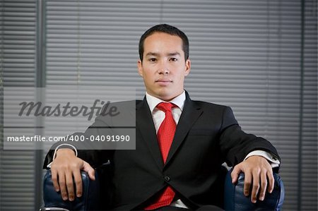 Handsome cute business man with concentrated serious look