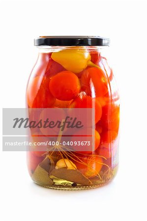 Clear glass jar of colorful pickled vegetables