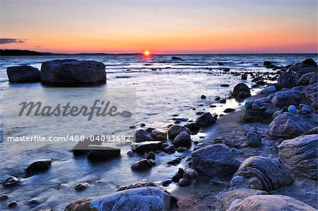 Sunset at the rocky shore of Georgian Bay, Canada. Awenda provincial park.
