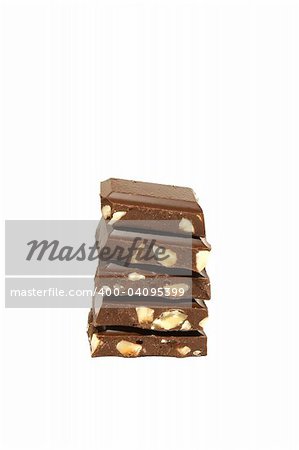 Hill from chocolate segments on a white background