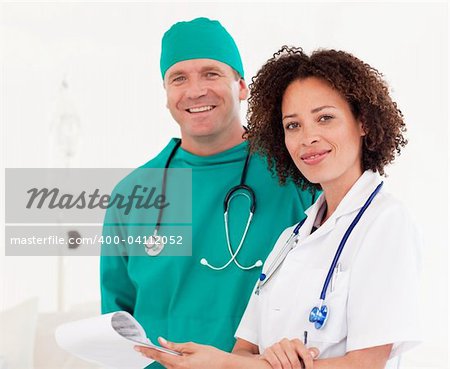 Portrait of Doctor and surgeon in a hospital togehter