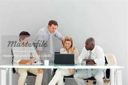 Young business people interacting in a meeting