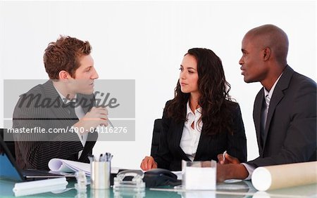 Young business people dicussing in an office