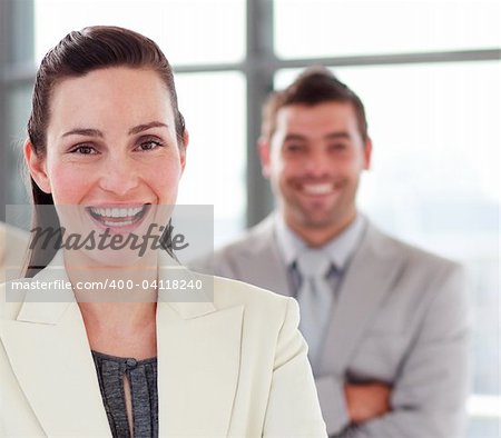 Attractive young businesswoman with a colleague