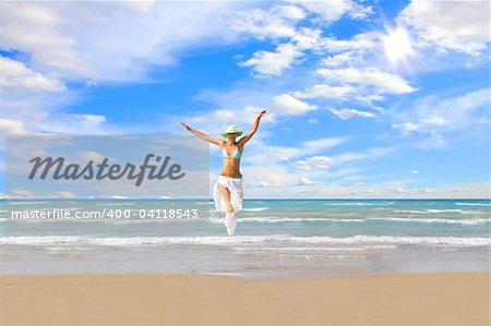 Beautiful young woman enjoying the Ionian sea in Greece