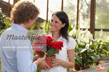 mid adult couple shopping in garden center