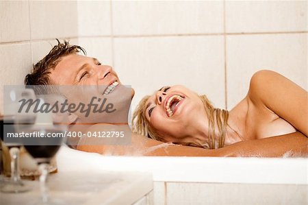 Happy couple bathing