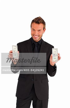Happy businessman with money looking at the camera
