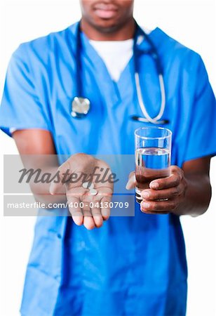 Young Afro-American doctor holding pills and glass of water in front of the camera