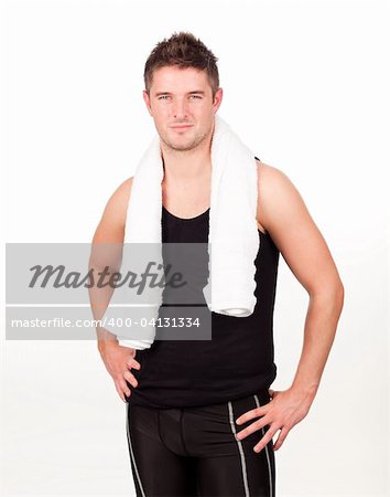 Young athlethic man with a towel wrapped around him