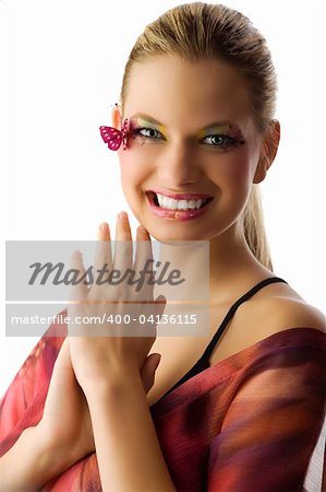 very cute girl with creative make up looking in camera with a great smile
