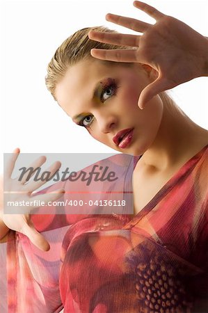 pretty blond girl in act to stop the camera of shooting with hands