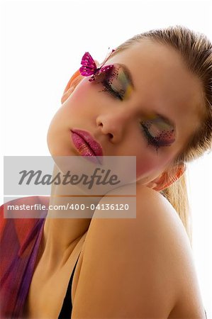 cute blond woman with artistic make up with closed eyes as is sleeping