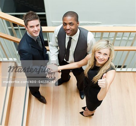 High view of Business people shaking hands and talking