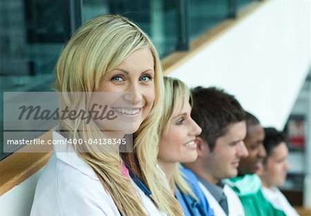 Group of doctors  in a hospital office and smiling
