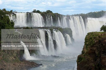 The massive waterfalls of Iguazu, Argentina, cut their way through the tropical jungle