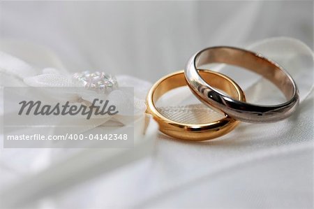 Wedding rings on a satiny fabric