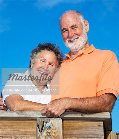Portrait of beautiful, happy senior couple outdoors.