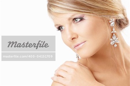 Portrait of the beautiful blonde with jewelry, isolated